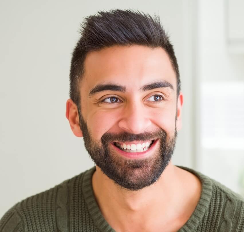 Smiling man with tooth colored fillings