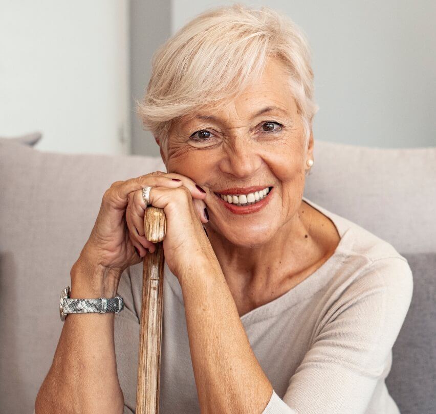 Woman with dentures smiling