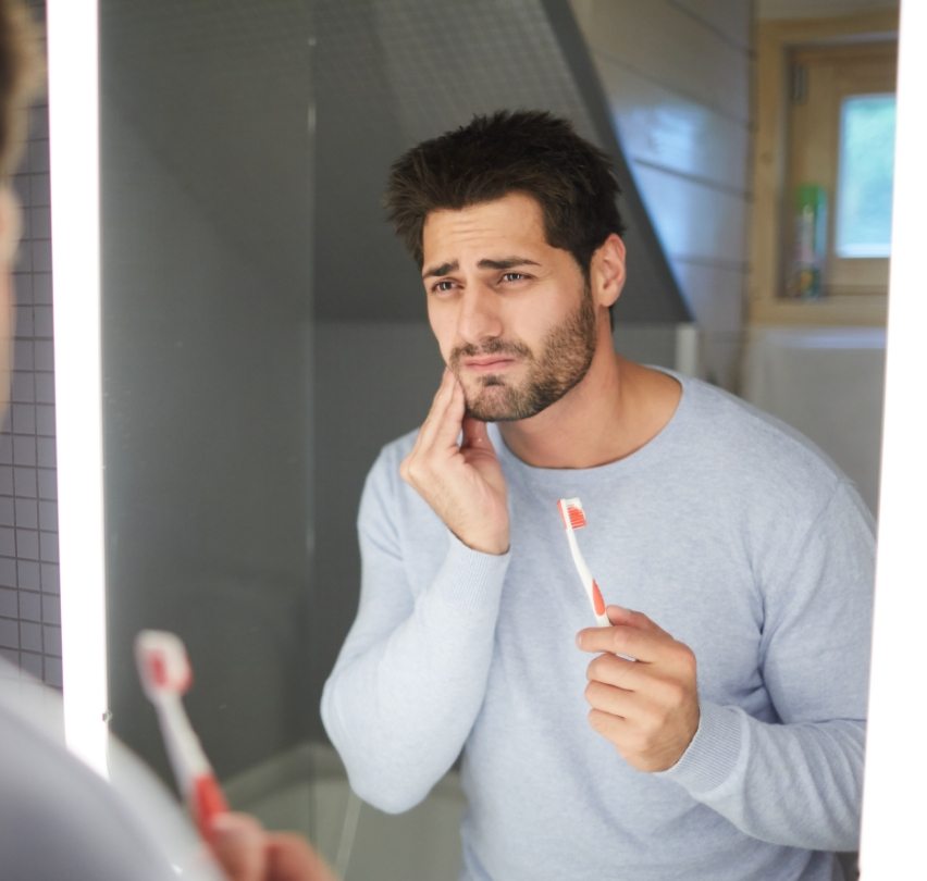 Man brushing teeth