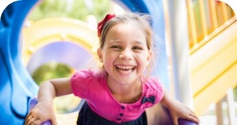 Youn girl smiling after children's dentistry visit